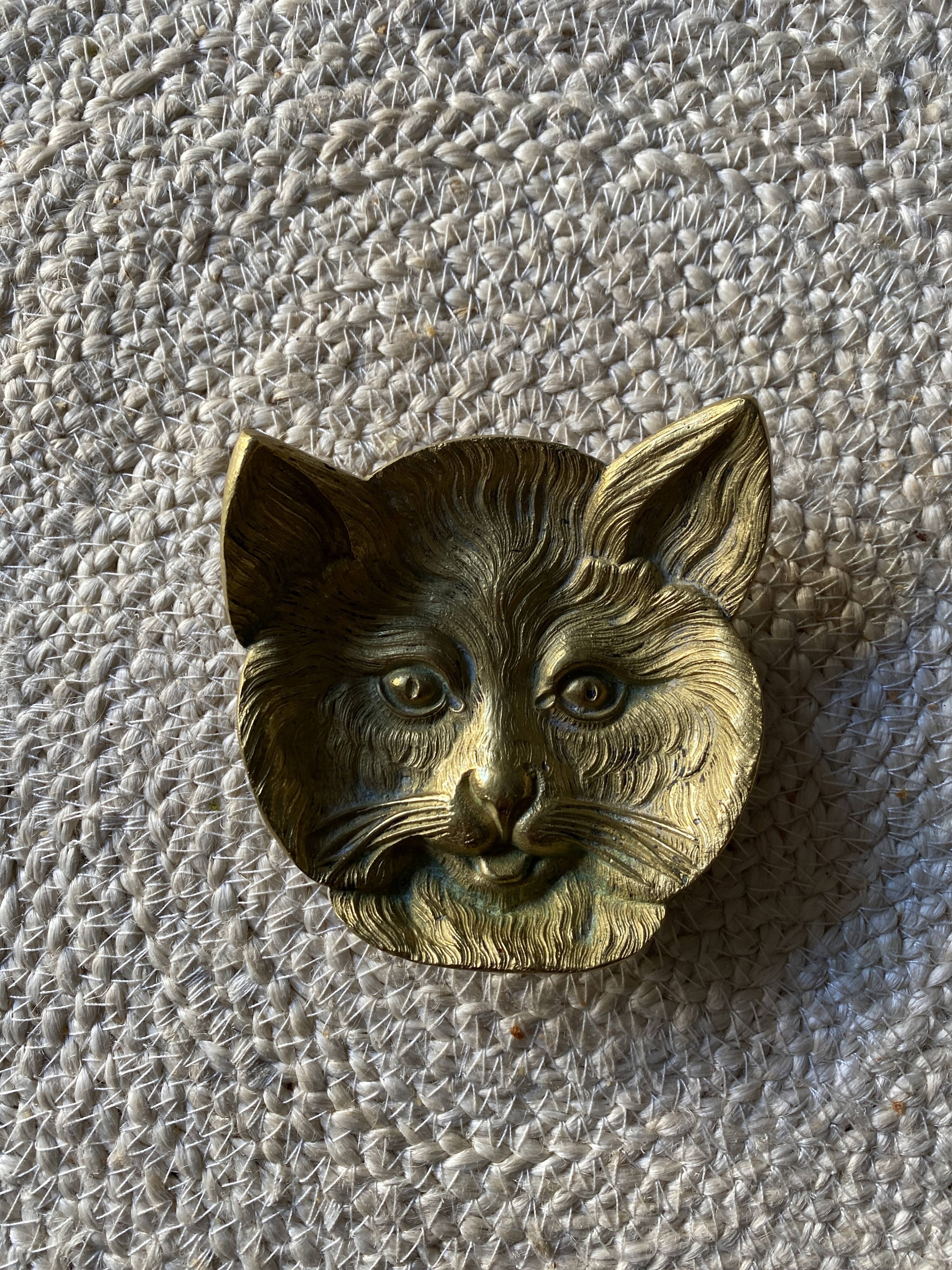Brass cat's head