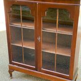 English display case with 2 wooden bodies