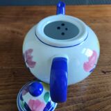Antique teapot with flower pattern