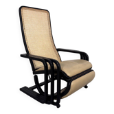 Rocking lounge chair, curved wood, leather, Viennese cane design.