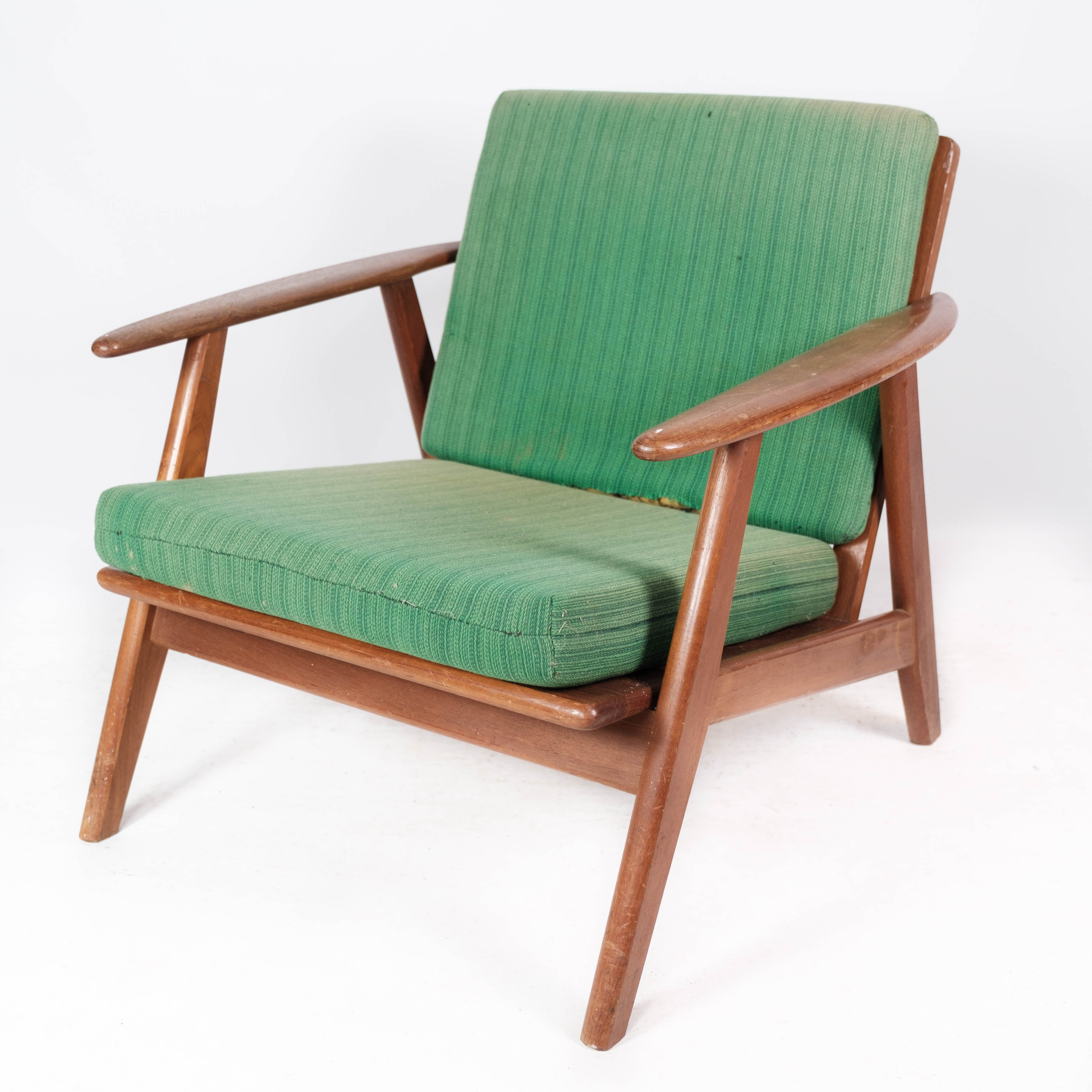 Easy chair in teak and with green upholstery of Danish design, 1960s