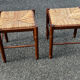 Paire de tabourets années 50 en bois et assise paillée