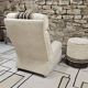 Boucle wool fireside chair and its 1970" vintage pouf