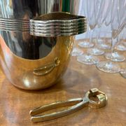 Alpaca champagne bucket from the 1920s with its monopole tongs.