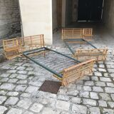 Twin rattan beds with built-in bedside tables