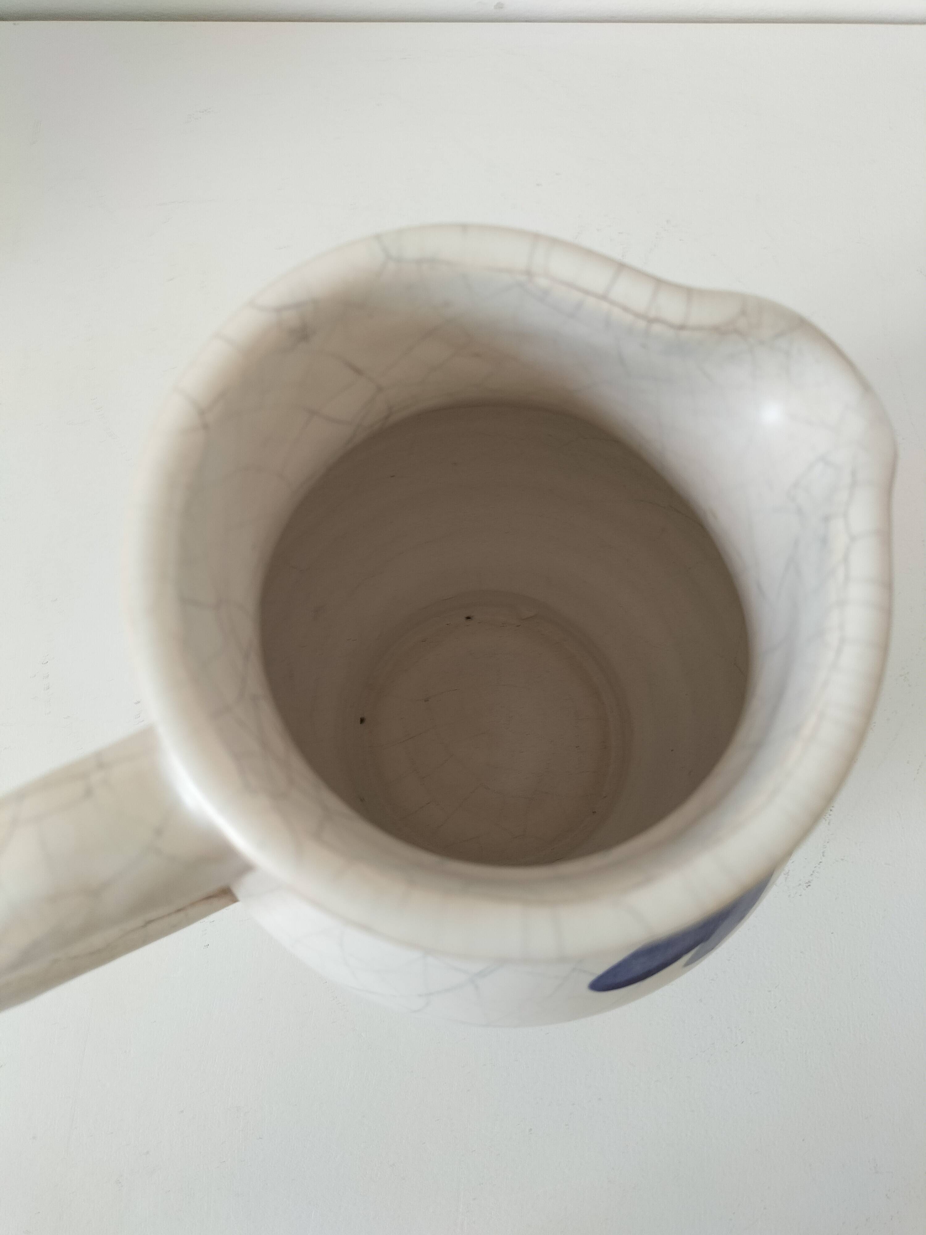 Vintage pitcher with floral decoration in the style of Poterie du Marais