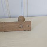 Wall-mounted coat rack with 3 hooks