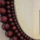 Miroir vintage bohème en perles de bois