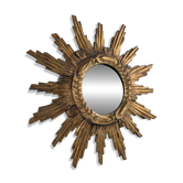 Convex sunburst mirror in carved and gilded wood, 1950s