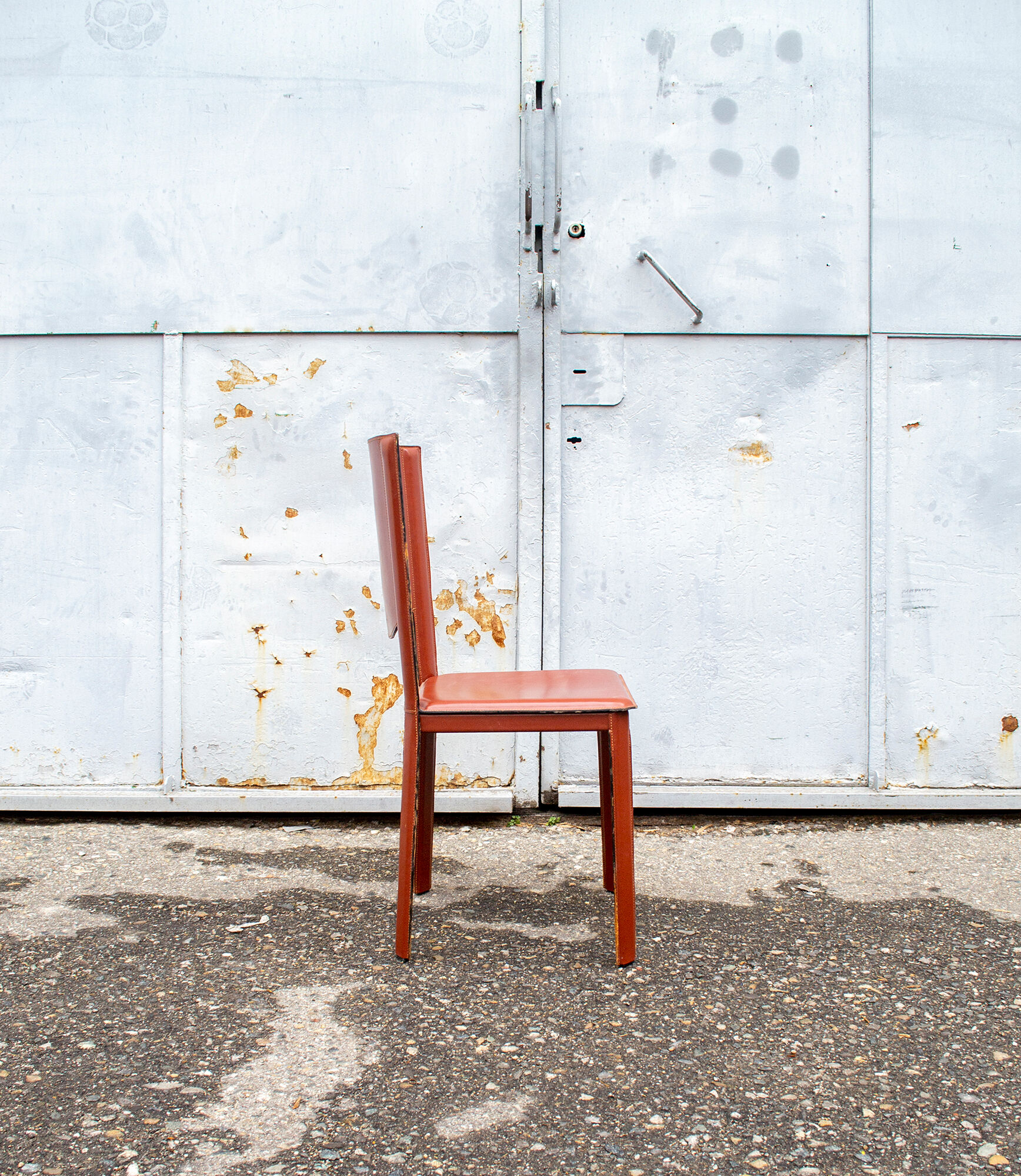 Set of four leather chairs by Enrico Pellizzoni 70s