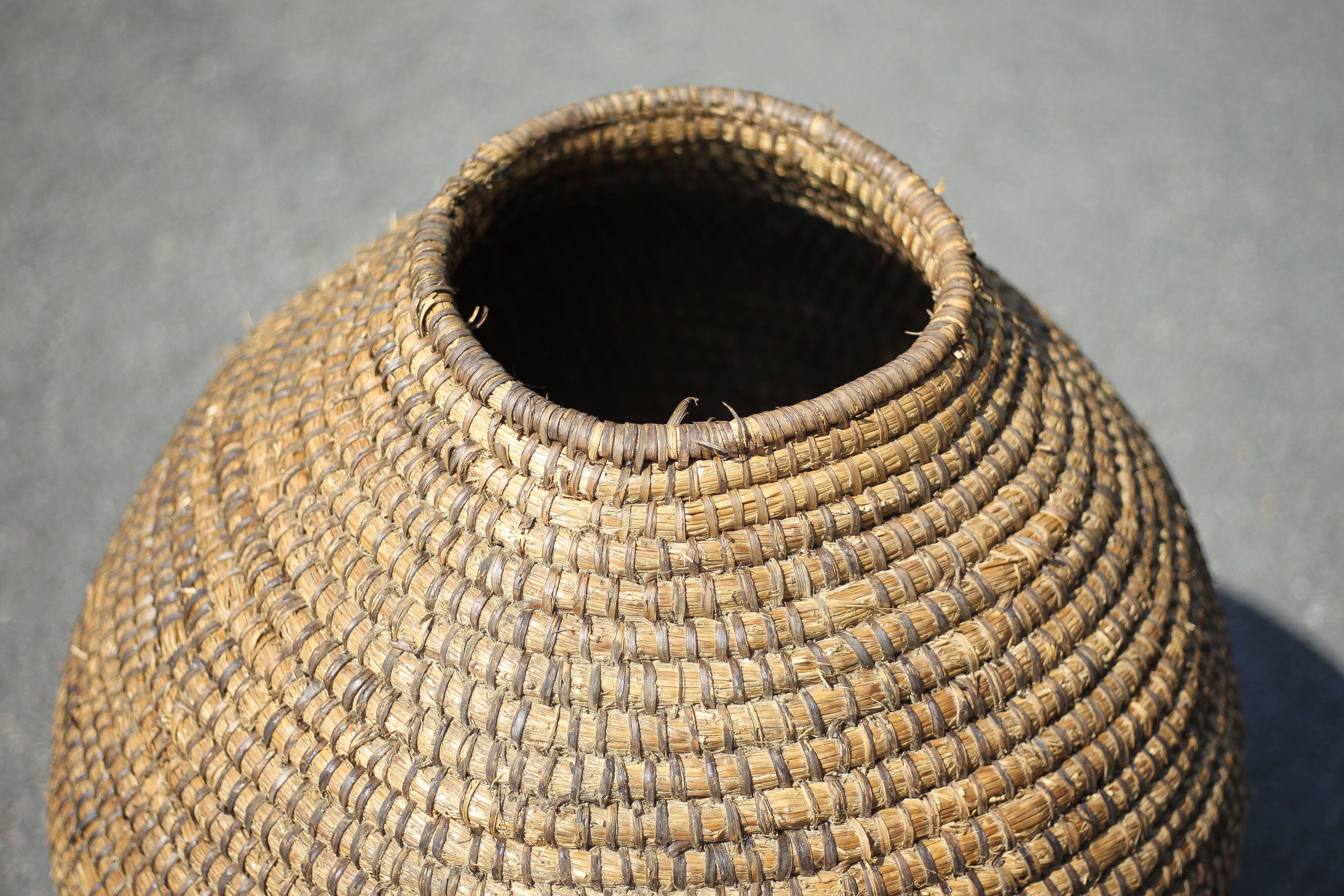Large old basket, burgundy straw and bramble, woven basket