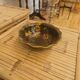 Vintage Asian brass bowl with floral decoration.