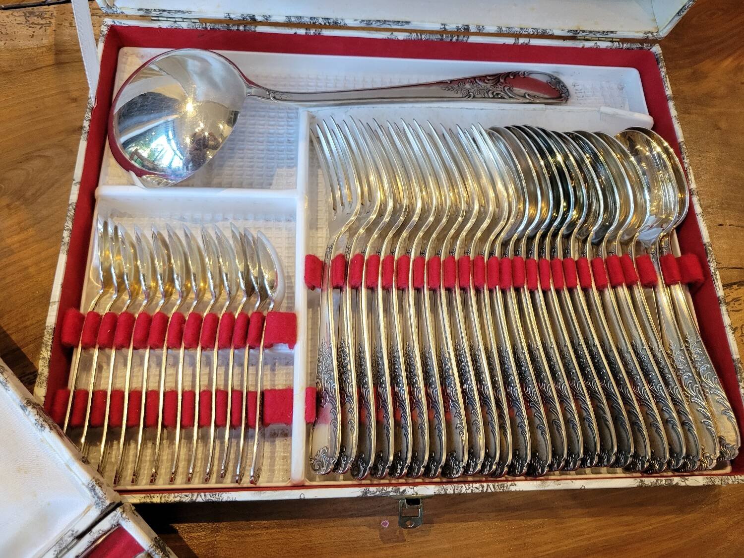 49-piece silver flatware set