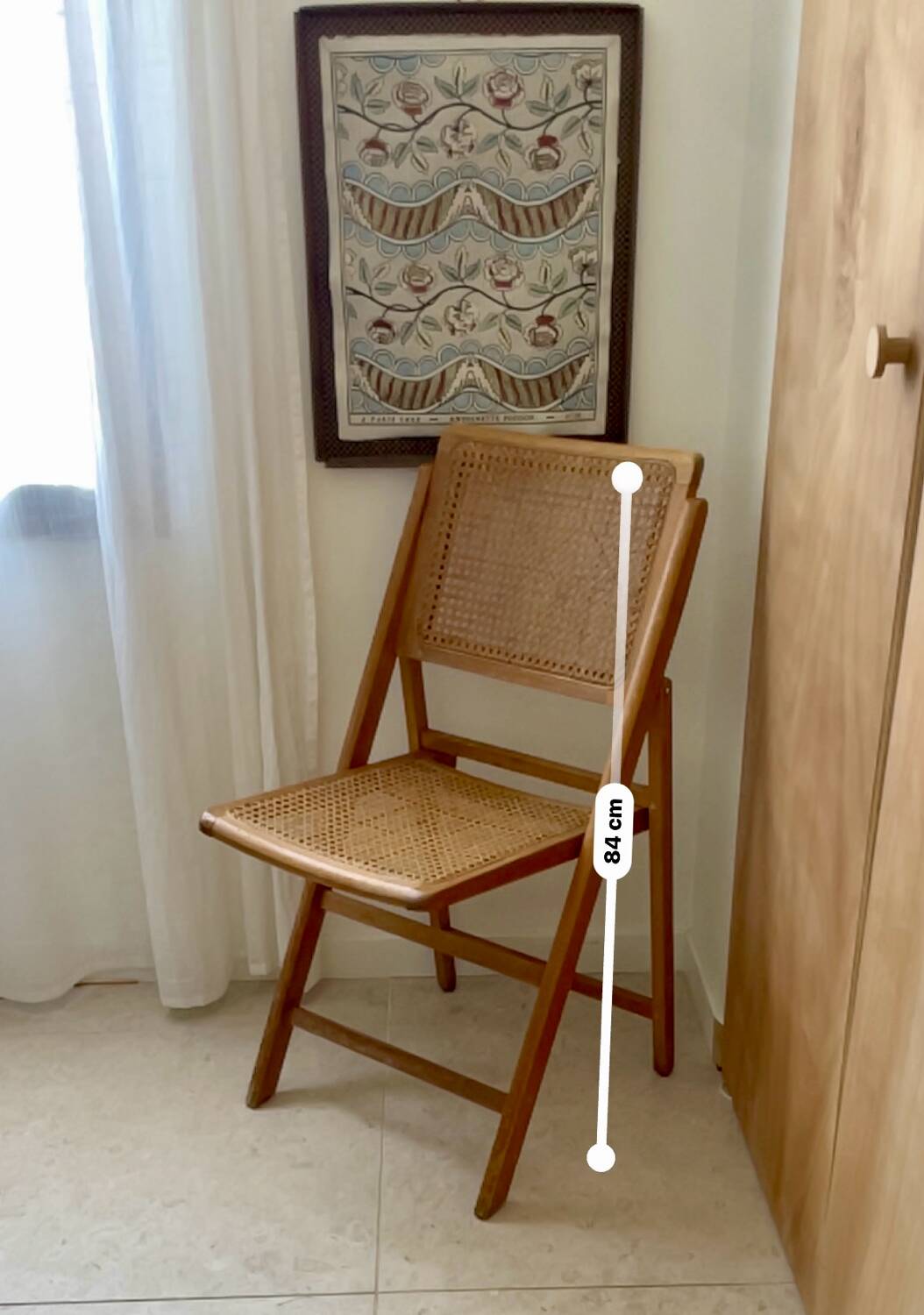 Folding wooden and cane chair