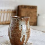Small vintage hand turned ceramic milk jug with rustic glaze