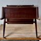 Old Scandinavian style magazine rack in dark wood with integrated brass ashtray