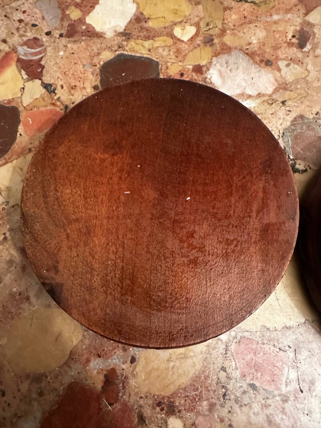 Pair of turned and carved wooden bottle coasters from the 1950s.
