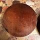 Pair of turned and carved wooden bottle coasters from the 1950s.