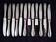 Coffret de 12 couteaux de table monocoques en acier Comargent