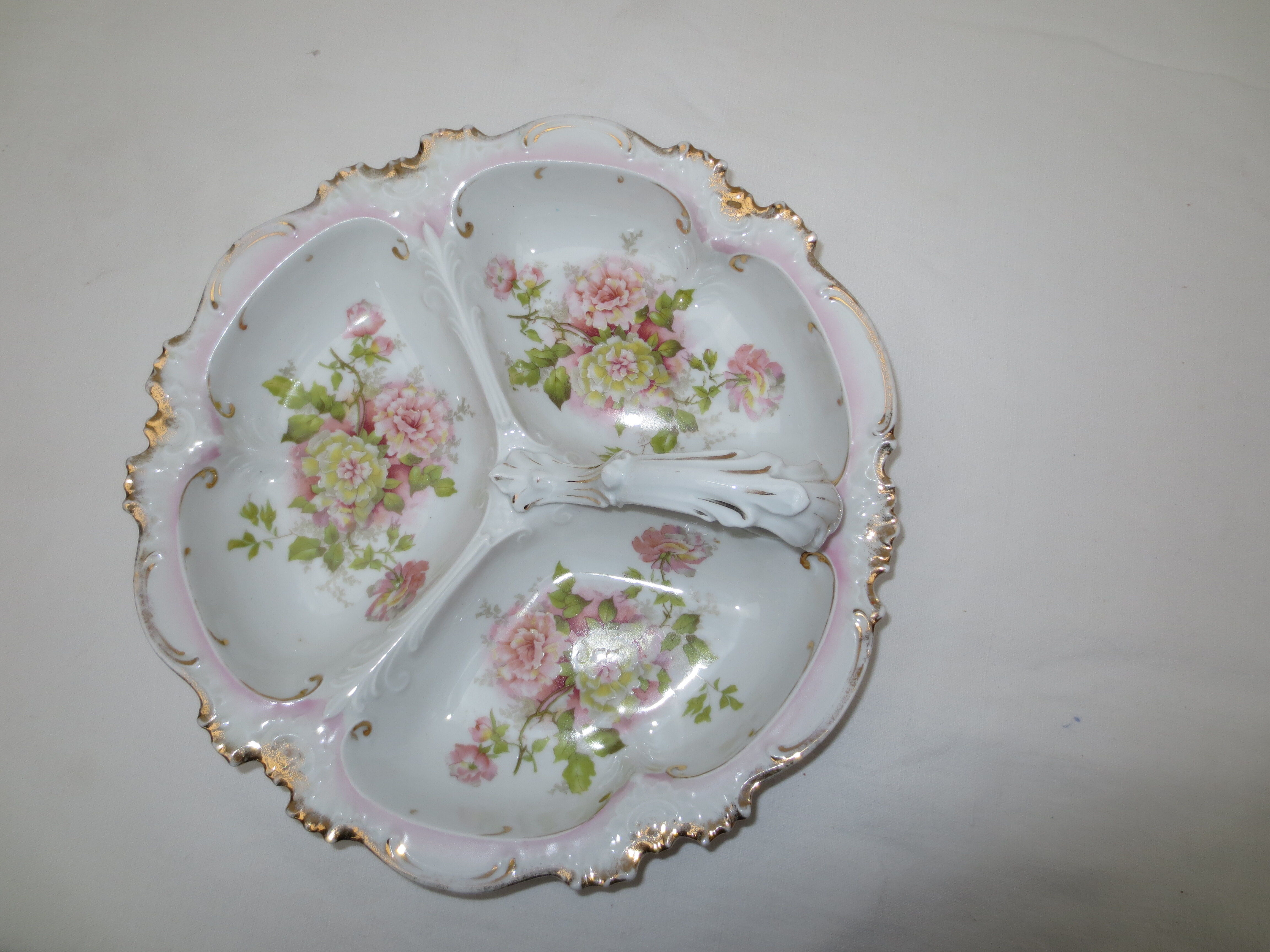 Numbered decorated porcelain quarter dish for hors d'oeuvre or other