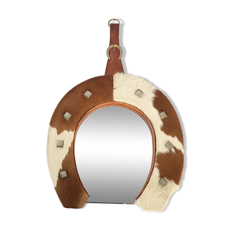 Vintage 1970s cowhide horseshoe mirror