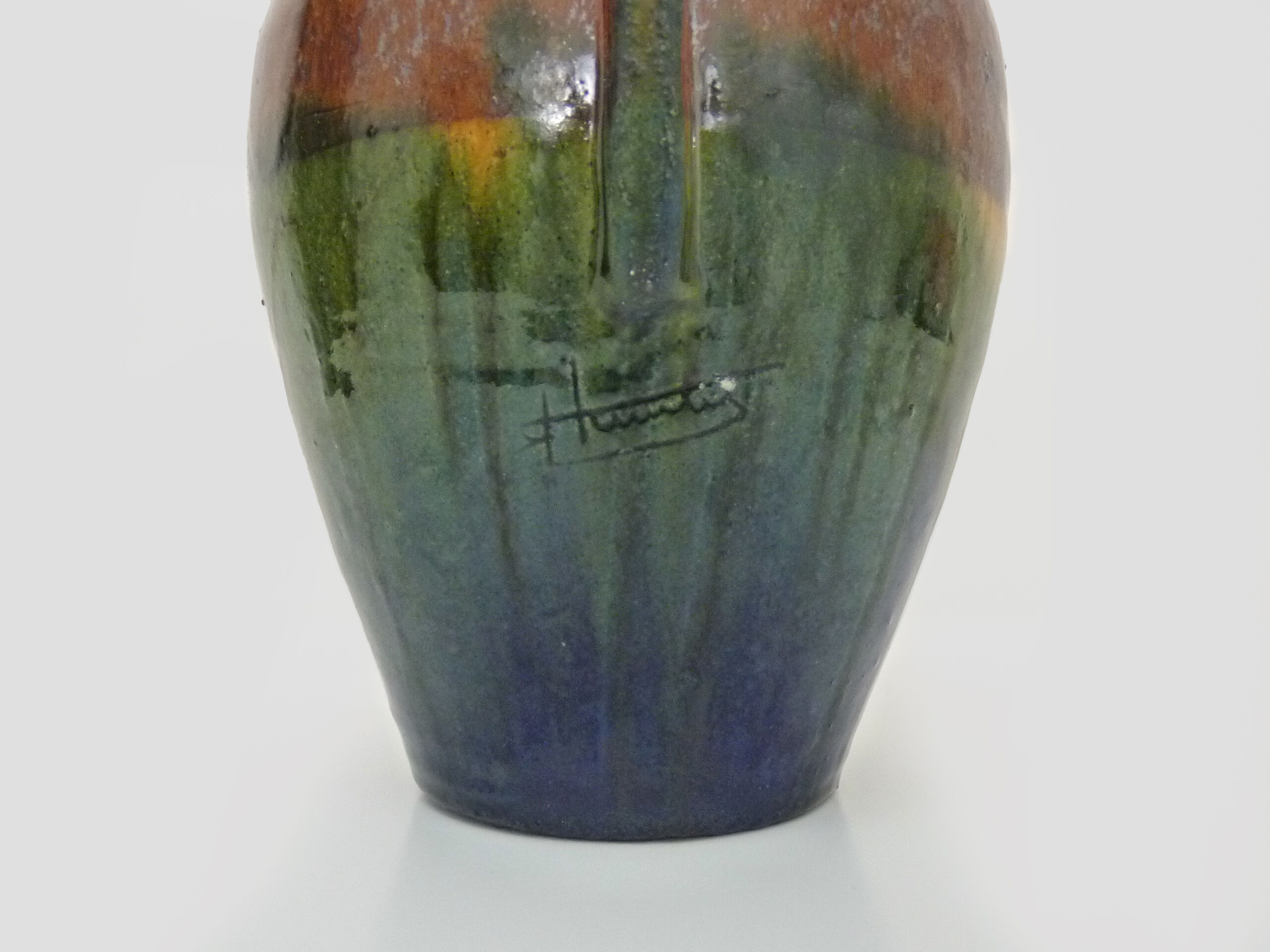 Vase in flamed stoneware with Rambervillers style ear. Signed