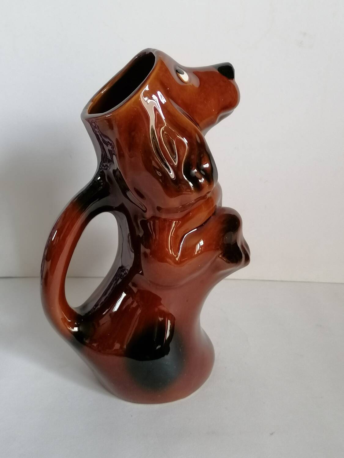 Zoomorphic dachshund dog pitcher in majolica slip