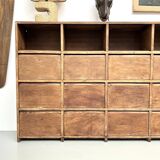 Meuble de métier ancien à 24 casiers