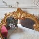 Miroir style Louis XV en bois sculpté doré 90x58cm