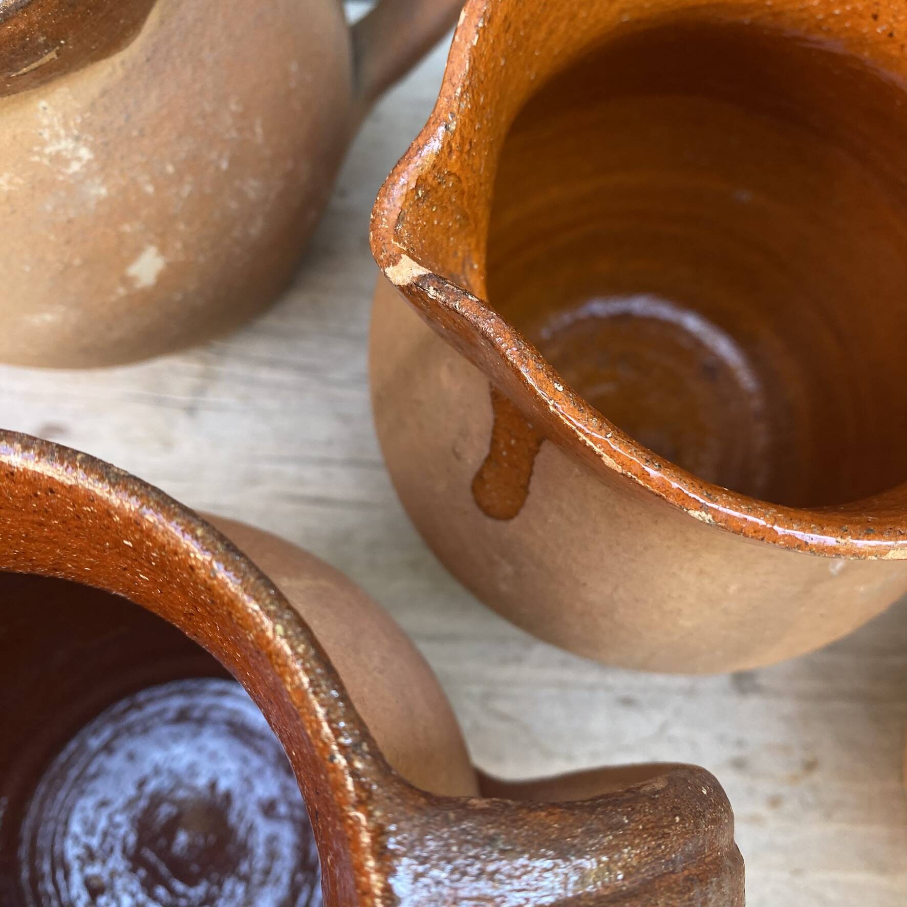 set of terracotta jugs country style