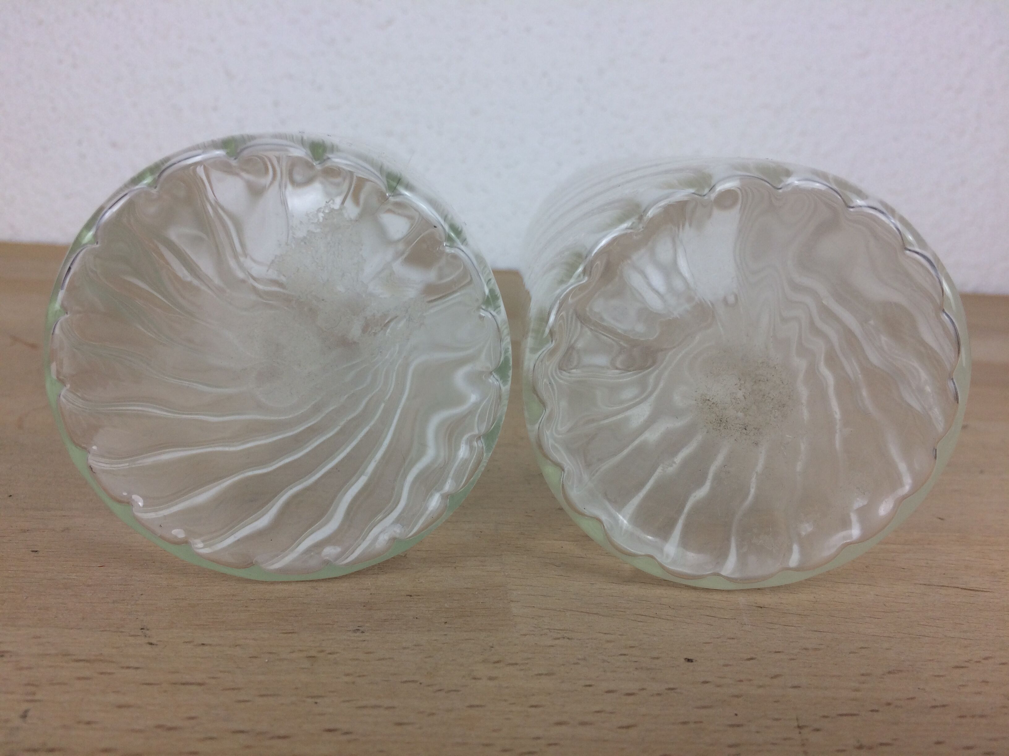 Pair of twisted glass bathroom bottle bottles
