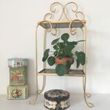 Shelf on feet in gold metal and black shelves