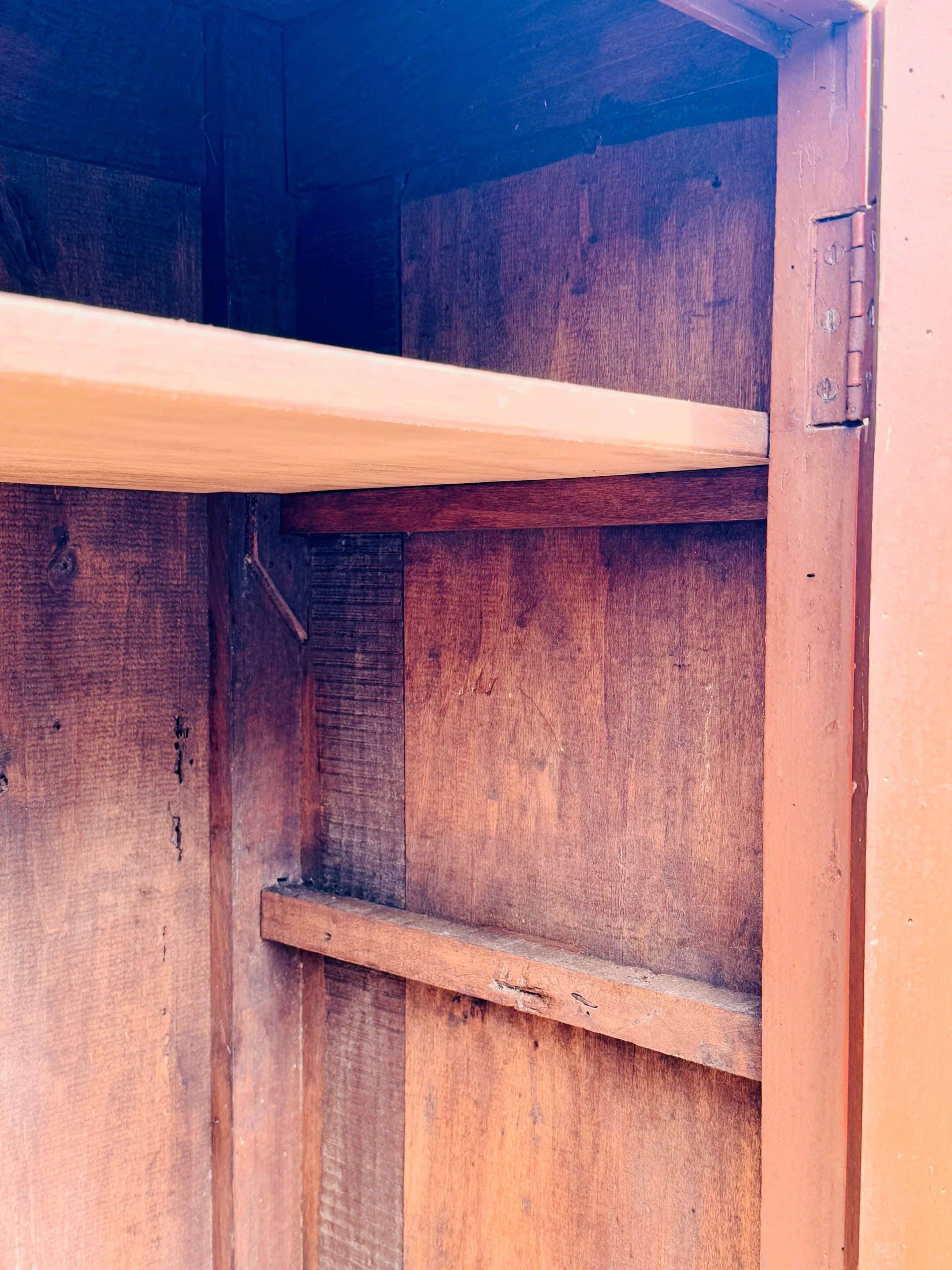 Old terracotta-colored bonnet maker