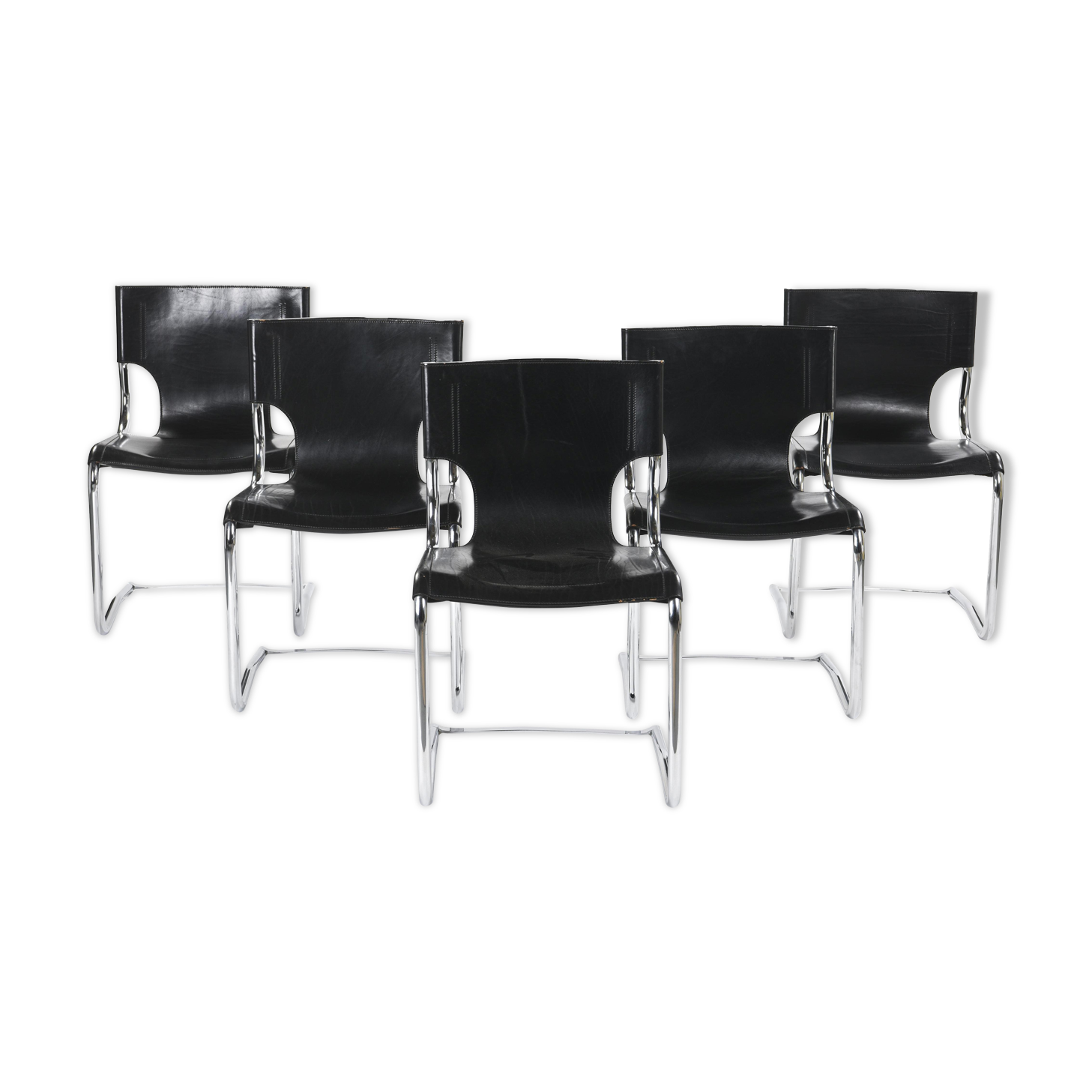 Black leather chairs by Carlo Bartoli
