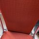 Pair of vintage folding chairs in terracotta fabric.