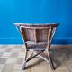 Small child vintage armchair in rattan