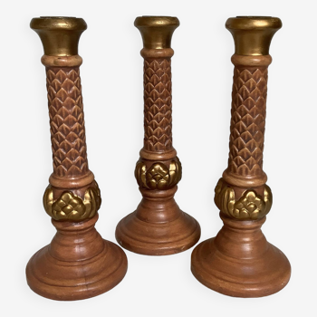 Trio of large painted plaster candlesticks