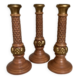 Trio of large painted plaster candlesticks