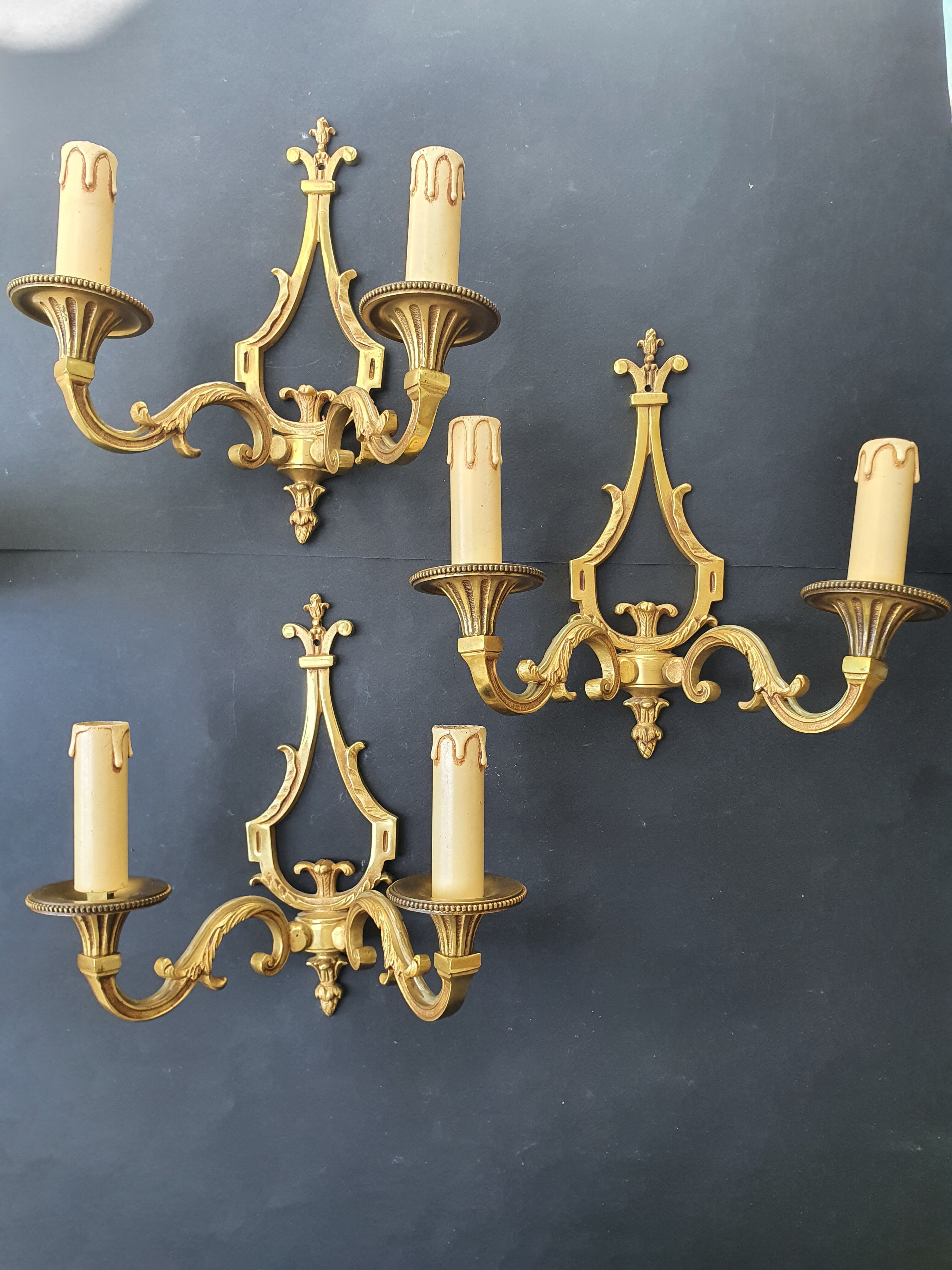 Three Louis XVI bronze wall sconces by Lucien Gau, Paris, antique.