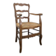Wicker armchair in Louis XV style