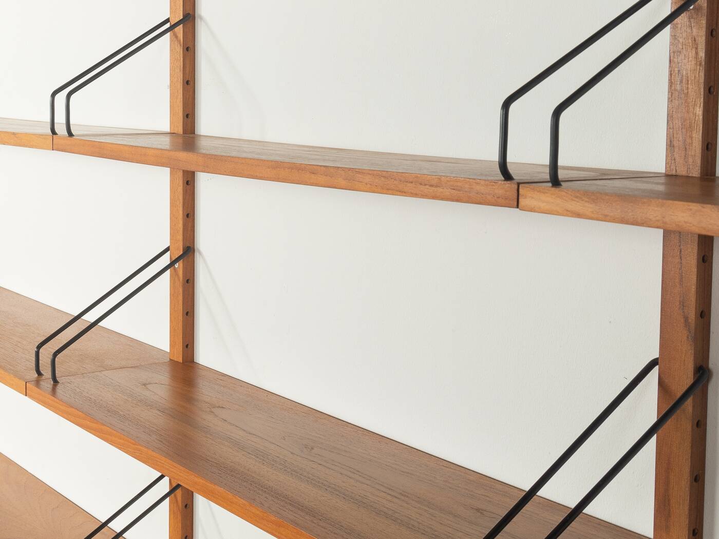 Classic wall shelf by Poul Cadovius for Cado, 1950s, teak veneer, 18 shelves, 4 ladders, Denmark