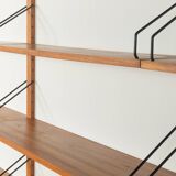 Classic wall shelf by Poul Cadovius for Cado, 1950s, teak veneer, 18 shelves, 4 ladders, Denmark