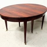 Louis XVI style bandeau table with 6 XIX century tapered legs.