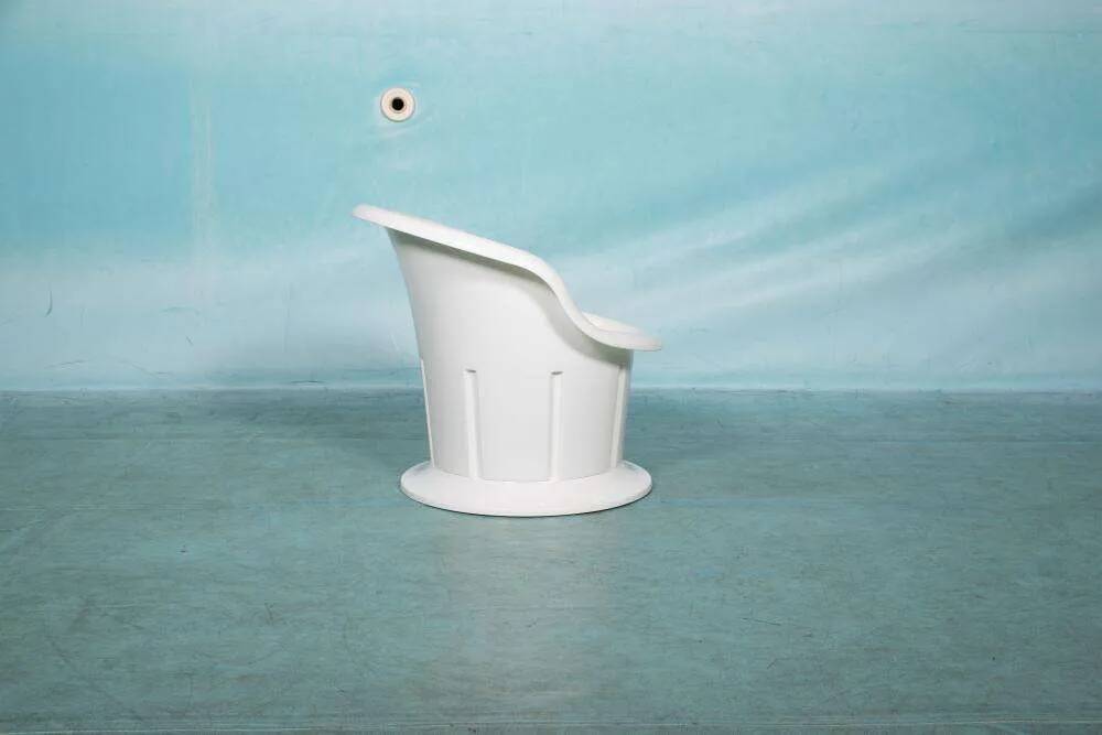 Space-age shell chair with storage, Ikea Popptorp chair.