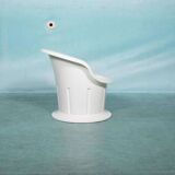 Space-age shell chair with storage, Ikea Popptorp chair.