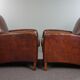 A very beautiful set of 2 Art Deco design armchairs in sheep leather