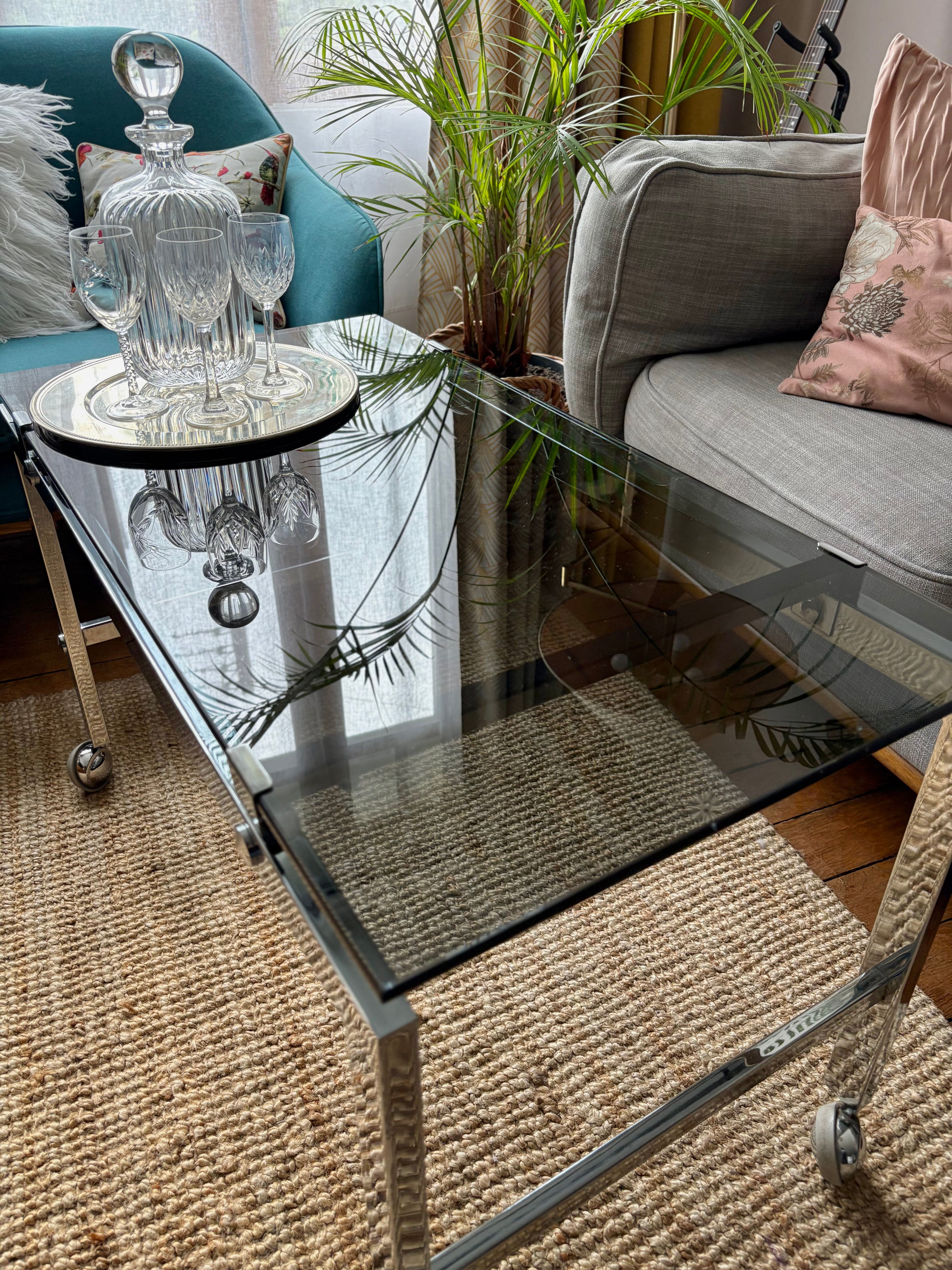 Chrome and smoked glass coffee table on wheels 1970