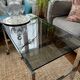 Chrome and smoked glass coffee table on wheels 1970