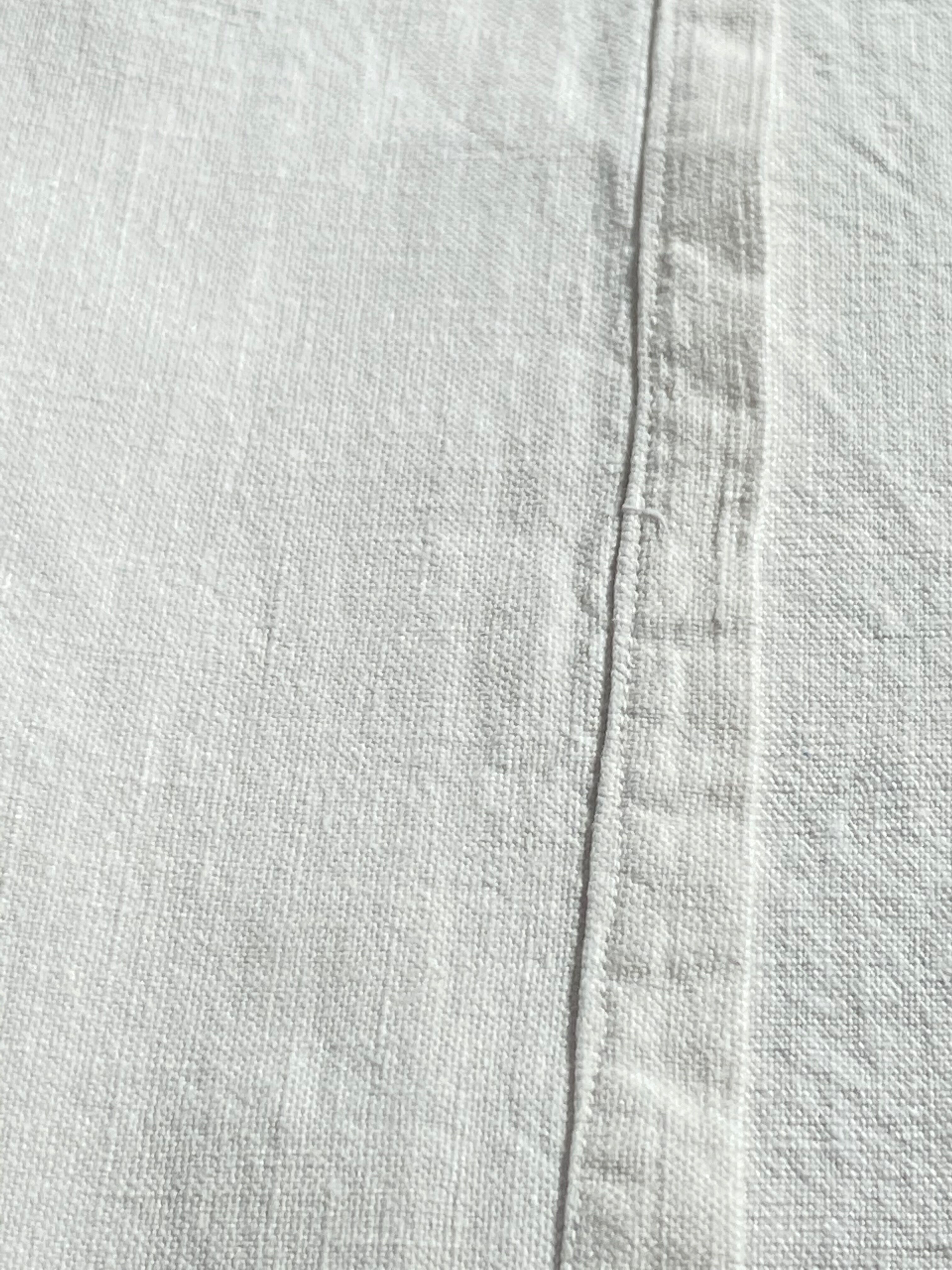 Old sheet with monogram