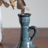 Antique candle holder in glazed ceramic